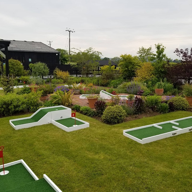Mini Golf Worcestershire set up at Curradine barns on the Lawn area